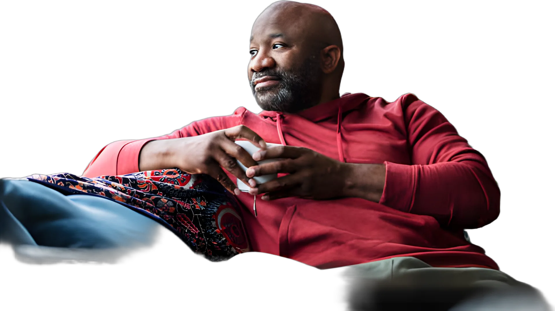 Man relaxing at home with a cup of tea